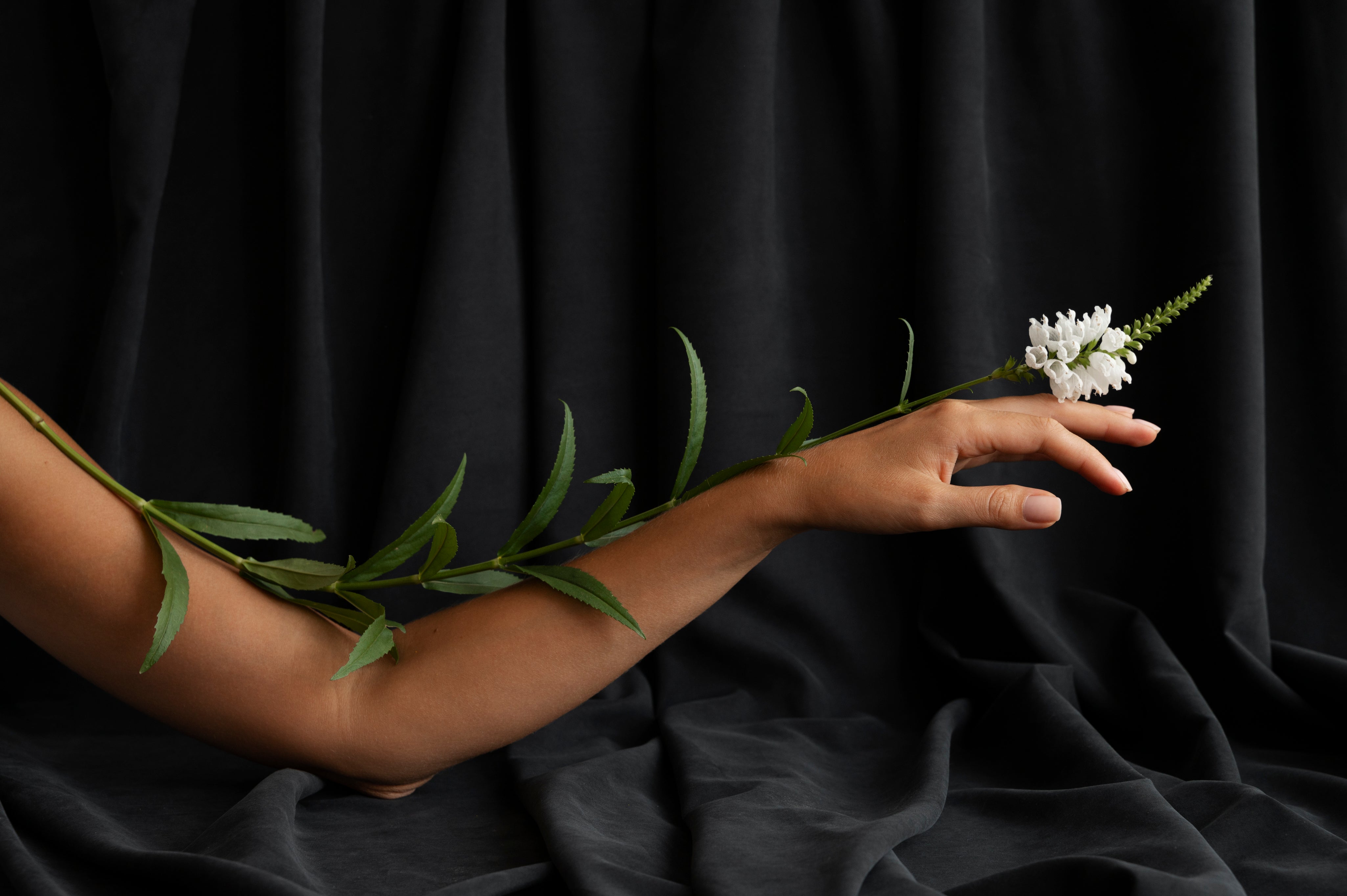 side-view-arm-posing-with-flower.jpg